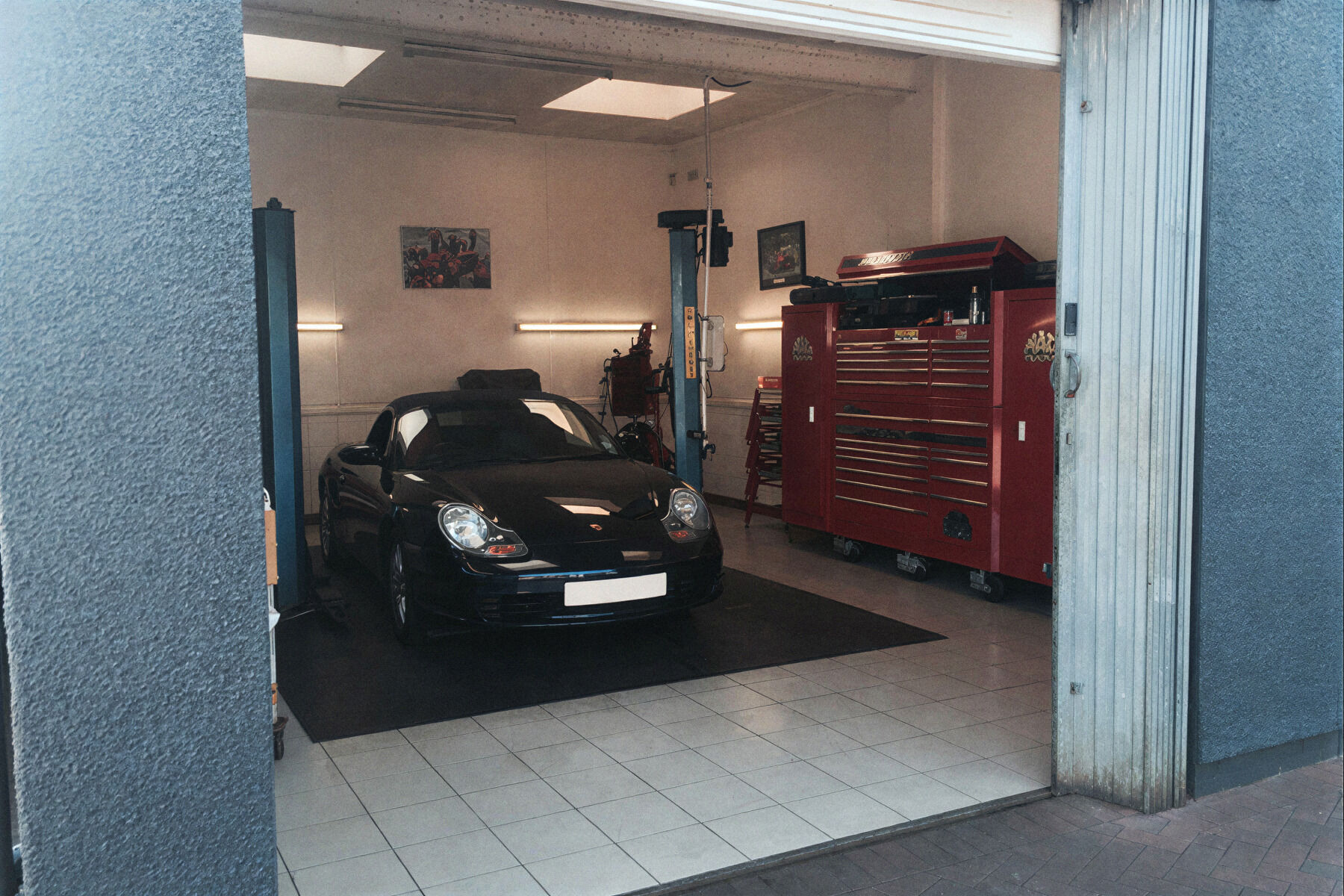Porsche Boxster in a service bay