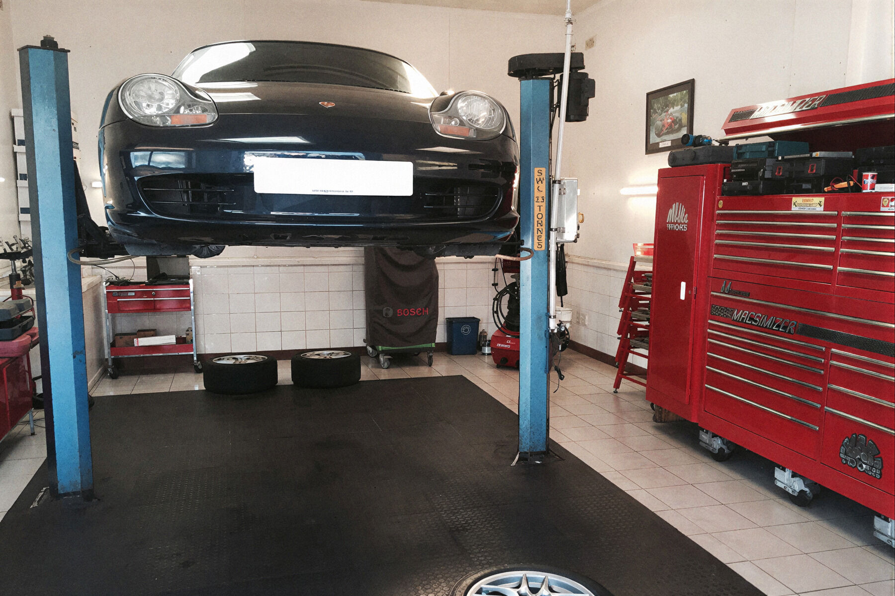 Porsche raised on a lift in the Tarduff Motors workshop